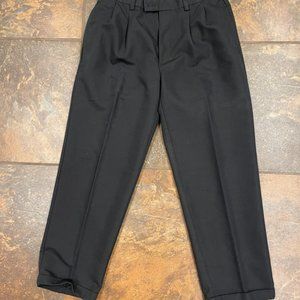 Solid black pleated front cuffed dress slack pants for men